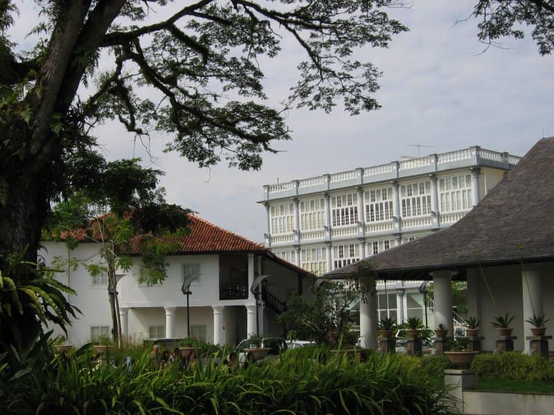 The colonnaded verandahs and clock tower of the Old Courthouse complex in central Kuching