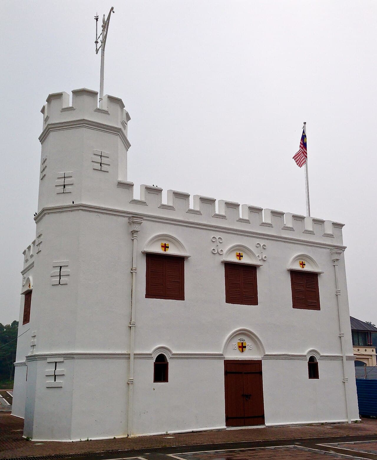 The whitewashed crenellated Square Tower standing on the Kuching Waterfront promenade
