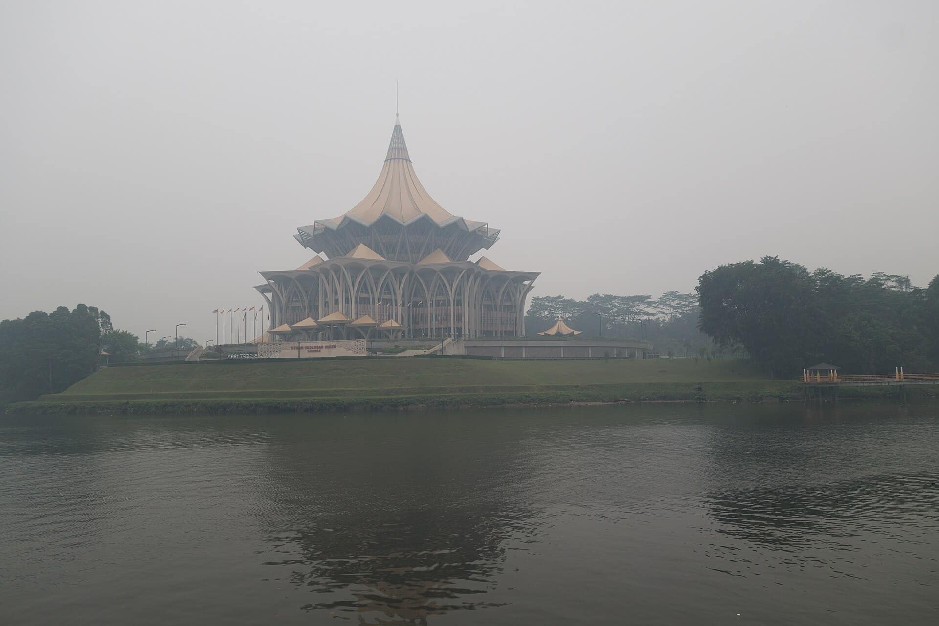 Obscured by smoke from farmers burning down the rain forest