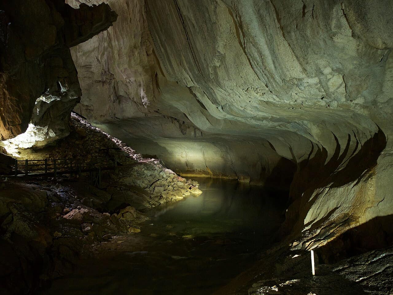 The lit boardwalk running through the passages of Clearwater Cave