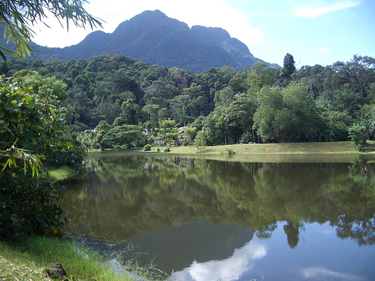 Traditional houses around the lake at the Sarawak Cultural Village