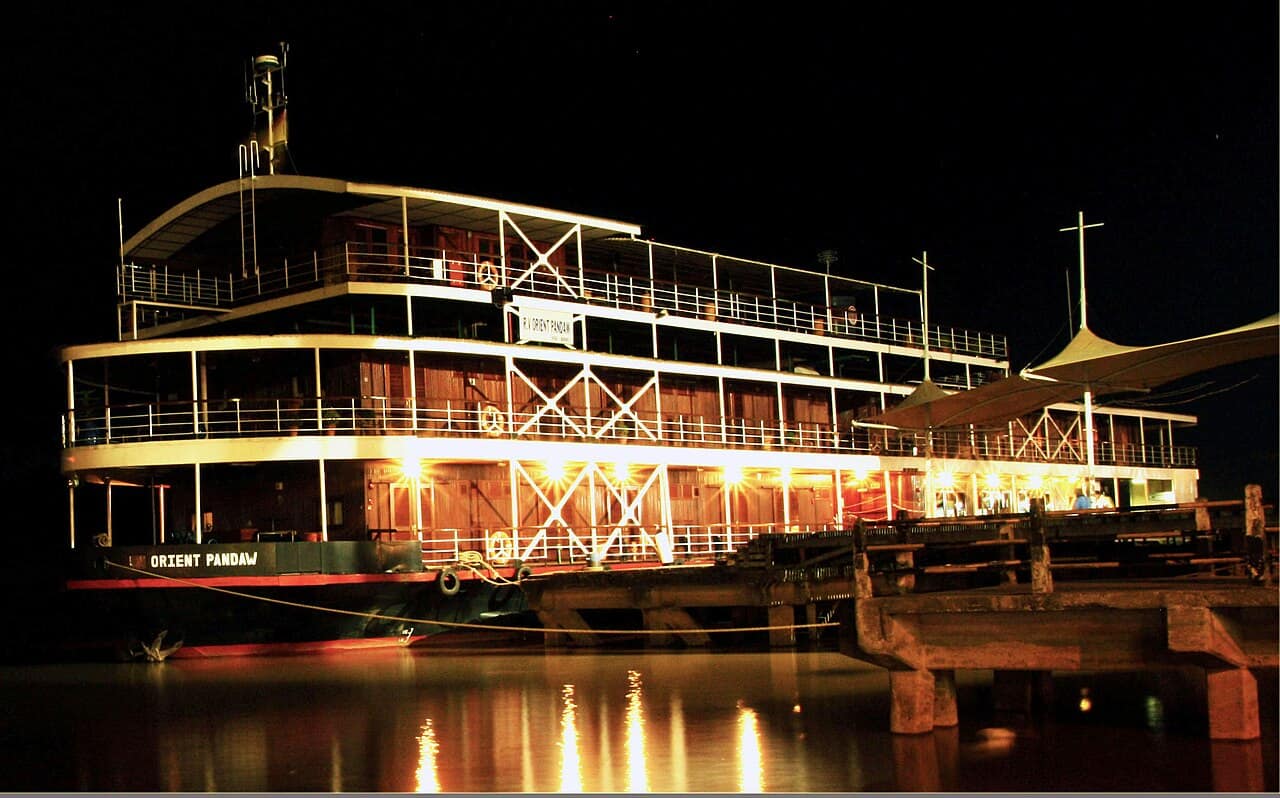 A river cruise boat on the Rajang at Sibu by night